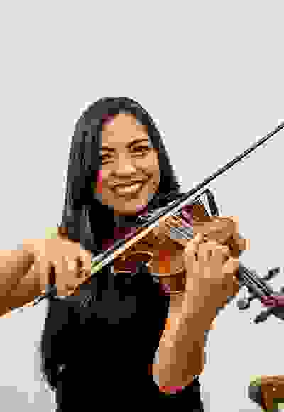 Smiling female solo violinist